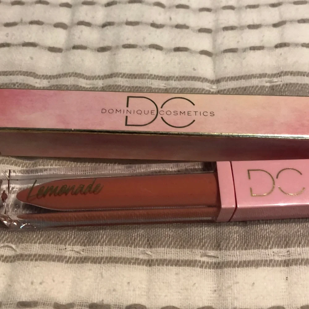 Dominique Cosmetics Peach Tea lip gloss new